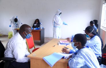 Ministry Staff at the registration desk before the COVID-19 test is conducted